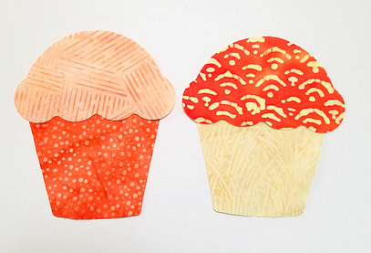 two cupcakes Photo of two orange cupcakes